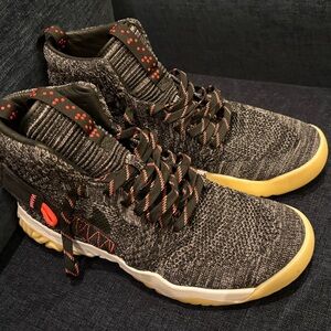 Jordan Knit High-Top Sneakers in Black and Orange